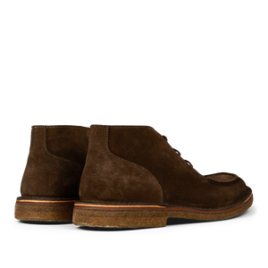 A pair of Dark Chestnut Suede Astorflex Dukeflex Chukka Boots with crepe soles, displayed side-by-side against a neutral background.