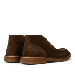 A pair of Dark Chestnut Suede Astorflex Dukeflex Chukka Boots with crepe soles, displayed side-by-side against a neutral background.