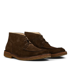 Astorflex's Dark Chestnut Suede Dukeflex Chukka Boots, made from rich vegetable-tanned suede with natural crepe rubber soles, are elegantly displayed on a white background.