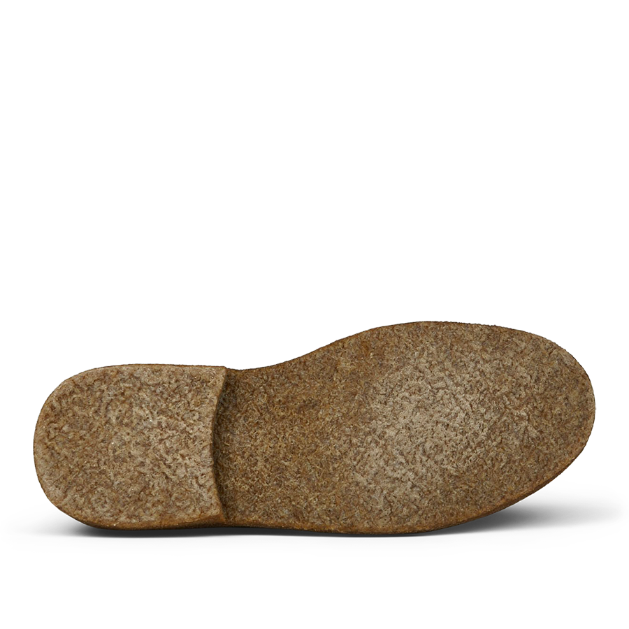 Brown Astorflex Dukeflex vegetable-tanned suede leather shoe sole isolated on a transparent background.