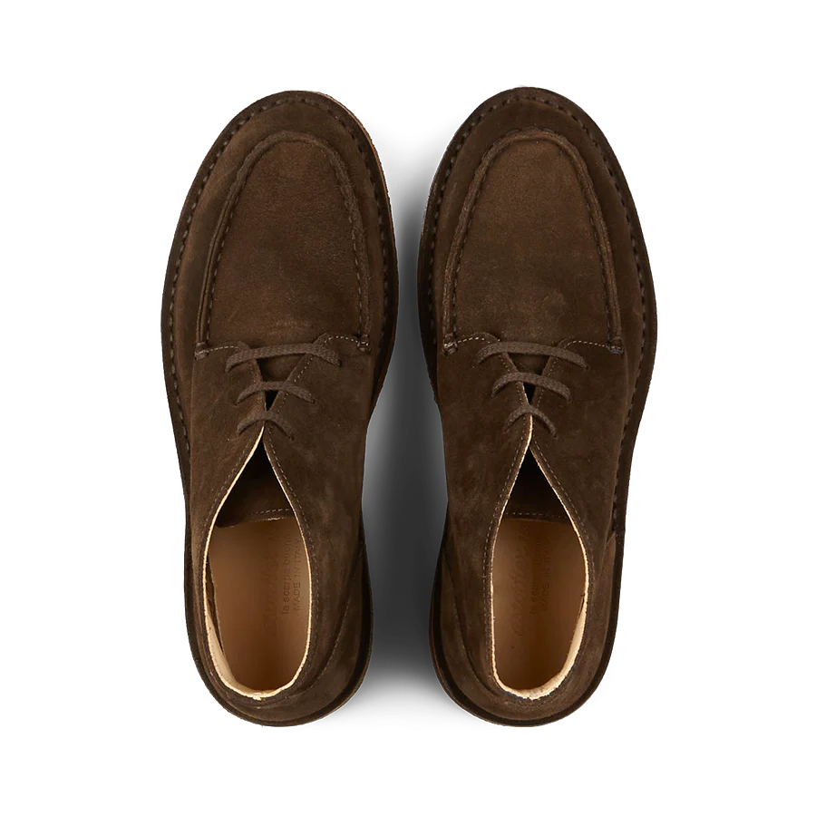 Top view of a pair of Astorflex Dark Chestnut Suede Dukeflex Chukka Boots crafted from vegetable-tanned suede, featuring visible stitching details.