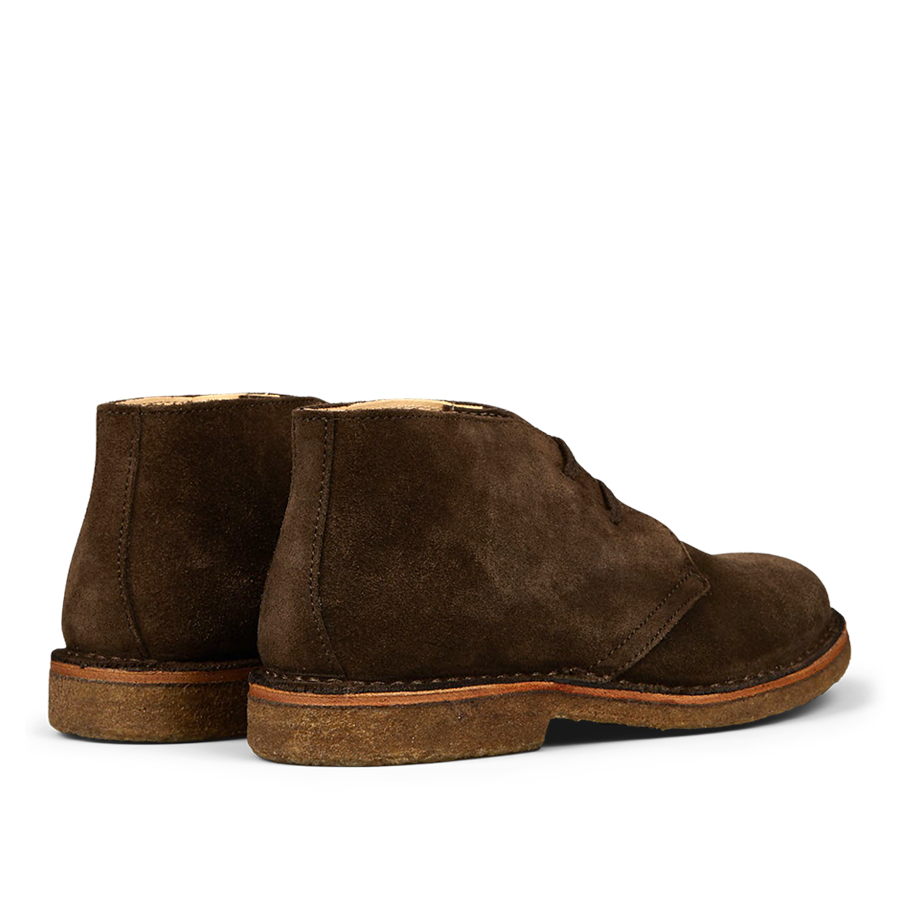 A pair of dark chestnut suede Astorflex Greenflex desert boots with crepe soles.