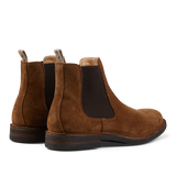 A pair of brown, vegetable-tanned suede Dark Khaki Suede Charlyflex Chelsea boots with elastic side panels by Astorflex.