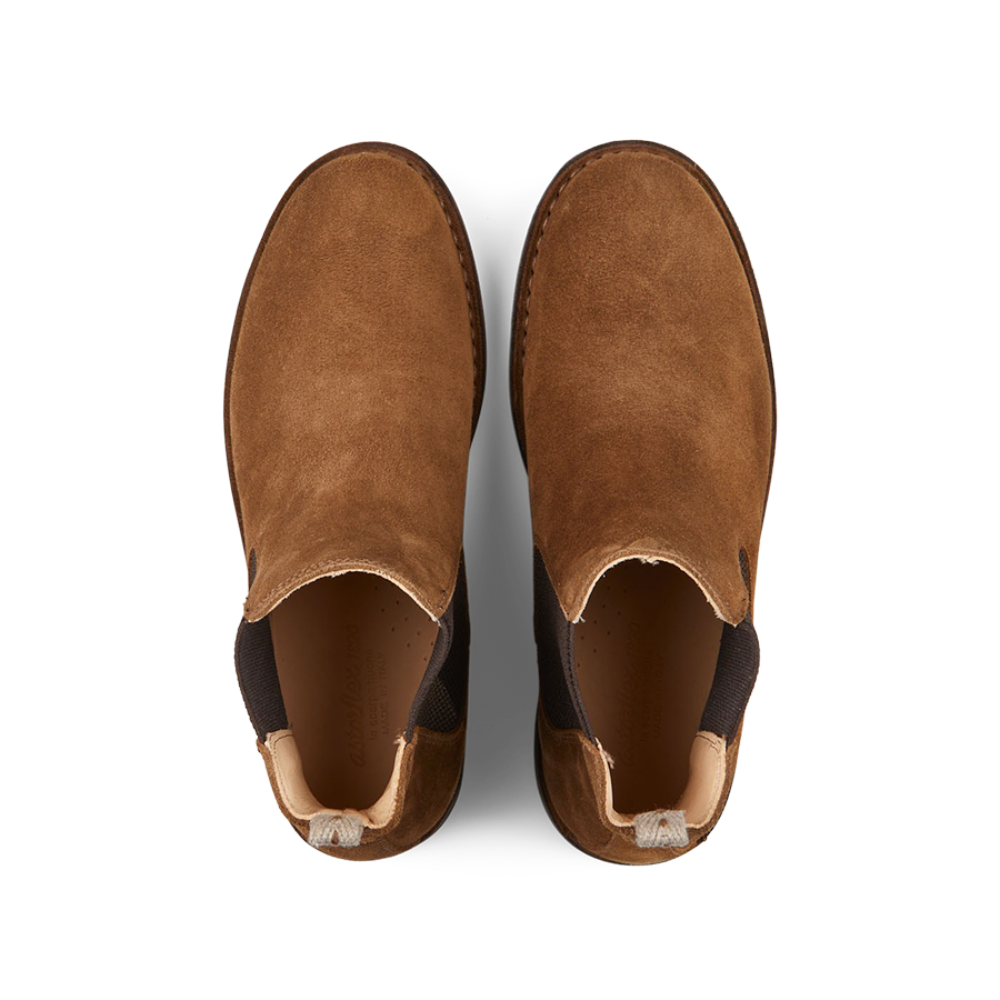 A pair of brown Astorflex Dark Khaki Suede Charlyflex Chelsea boots on a white background.