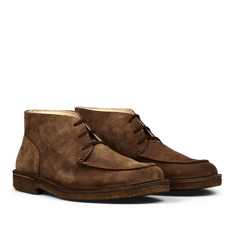 A pair of Dark Khaki Suede Dukeflex Chukka Boots by Astorflex, featuring laces, a textured natural crepe rubber sole, and an ankle-height design, crafted from luxurious vegetable-tanned suede.