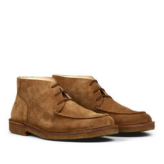 A pair of dark khaki suede Astorflex Dukeflex chukka boots displayed against a transparent background.