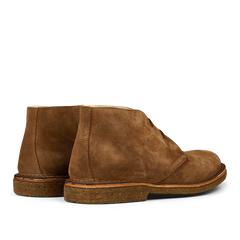 A pair of Dark Khaki Suede Greenflex Desert Boots with crepe soles by Astorflex.