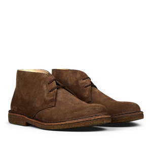 Angle view of Dark Khaki Suede Greenflex Desert Boots by Astorflex, featuring a low, flat sole and laces.