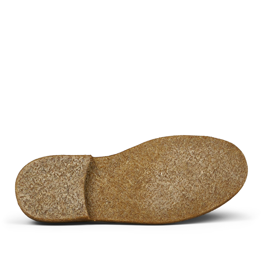 A single Dark Khaki Suede Greenflex desert boot cork sole isolated on a transparent background by Astorflex.