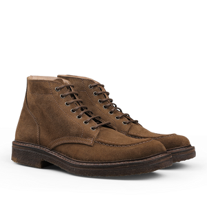 A pair of Dark Khaki Suede Leather Nuvoflex Boots by Astorflex, featuring dark brown crepe rubber soles.