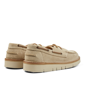 Pair of Astorflex Ecru Beige Suede Leather Boatflex Moccasins with rubber soles on a transparent background.