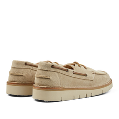 Pair of Astorflex Ecru Beige Suede Leather Boatflex Moccasins with rubber soles on a transparent background.