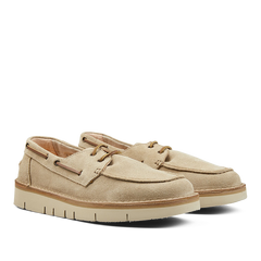 A pair of Ecru Beige Astorflex Suede Leather Boatflex Moccasins with white soles on a light background.