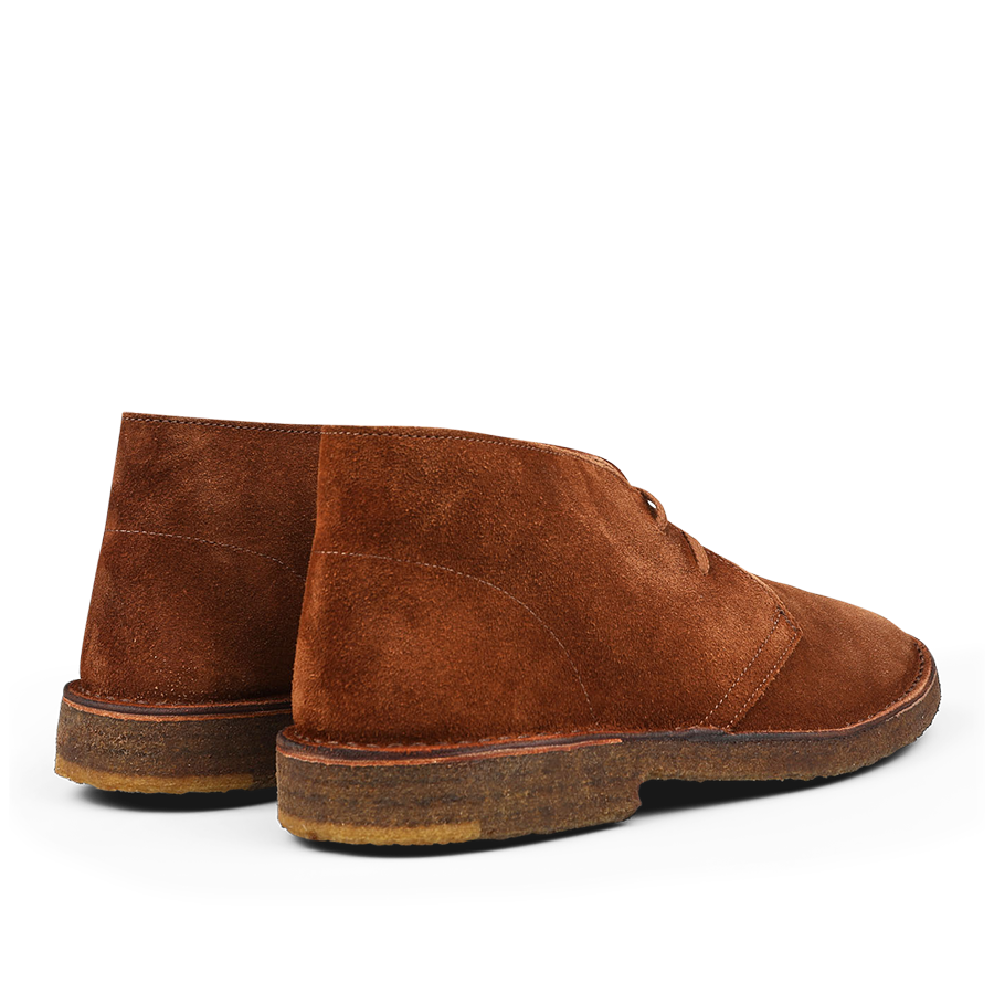 A pair of Mattone Brown Suede Leather Montflex Boots by Astorflex crafted from premium suede, featuring crepe soles, viewed from the back and slightly to the side.