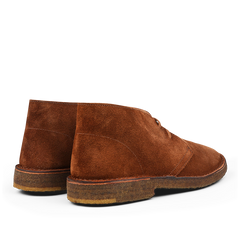 A pair of Mattone Brown Suede Leather Montflex Boots by Astorflex crafted from premium suede, featuring crepe soles, viewed from the back and slightly to the side.