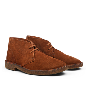 Brown suede chukka boots with laces, featuring a textured sole and simple design. Crafted from premium suede, these versatile Mattone Brown Suede Leather Montflex Boots by Astorflex offer both style and durability.