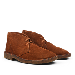 Brown suede chukka boots with laces, featuring a textured sole and simple design. Crafted from premium suede, these versatile Mattone Brown Suede Leather Montflex Boots by Astorflex offer both style and durability.