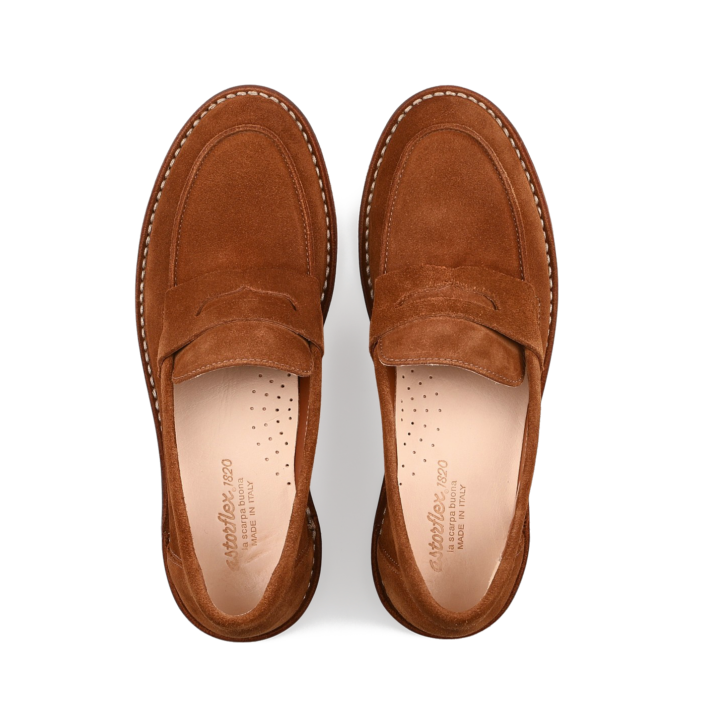 Viewed from above on a white background, the Mattone Suede Leather Buffalo Sadelflex Loafers by Astorflex are made of brown vegetable-tanned suede leather, featuring intricate stitching and perforated insoles.