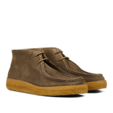 A pair of brown, vegetable-tanned Fumo Green Suede Rampiflex boots with crepe rubber soles by Astorflex.