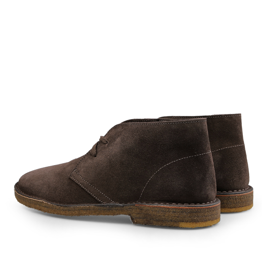 The Testa di Moro Suede Leather Montflex Boots by Astorflex, featuring dark brown premium suede, laces, and a textured Montflex sole, showcased from the side and slightly behind.