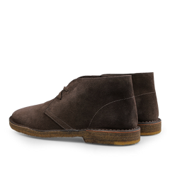 The Testa di Moro Suede Leather Montflex Boots by Astorflex, featuring dark brown premium suede, laces, and a textured Montflex sole, showcased from the side and slightly behind.