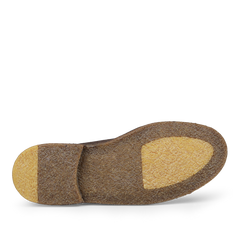 The image displays the bottom of the Testa di Moro Suede Leather Montflex Boots by Astorflex, highlighting a textured brown Montflex sole with lighter beige sections at the heel and ball.