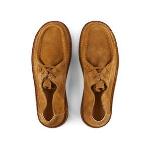 A pair of brown, vegetable-tanned suede loafers with Astorflex derby design and laces viewed from above.