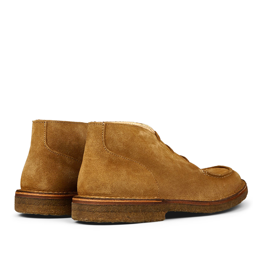 A pair of Whiskey Beige Suede Astorflex Chukka boots with visible stitching and rubber soles.