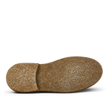 The image shows the sole of a brown, textured, vegetable-tanned Astorflex Whiskey Beige Suede Dukeflex Chukka Boots.