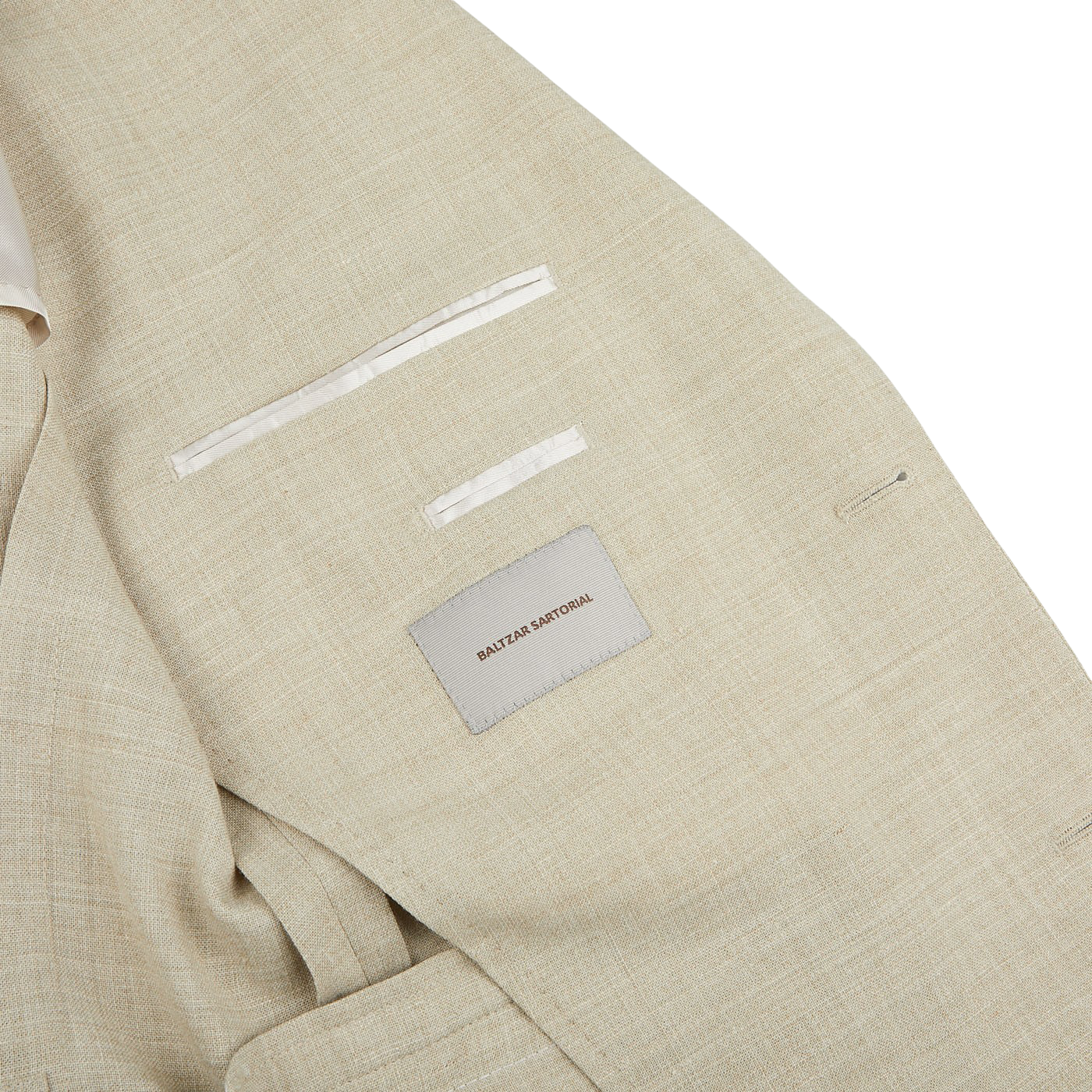A lightweight Beige Melange Wool Linen Suit Jacket with pleated trousers and a beige melange suit jacket, complete with a Baltzar Sartorial label.