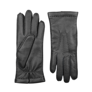 A pair of expertly designed Black Cashmere Lined Elk Gloves from Baltzar Sartorial showcases one glove lying flat and the other facing down, highlighting the intricate stitch patterns. These elk leather gloves feature textured detailing, underscoring the craftsmanship of their master glove makers.