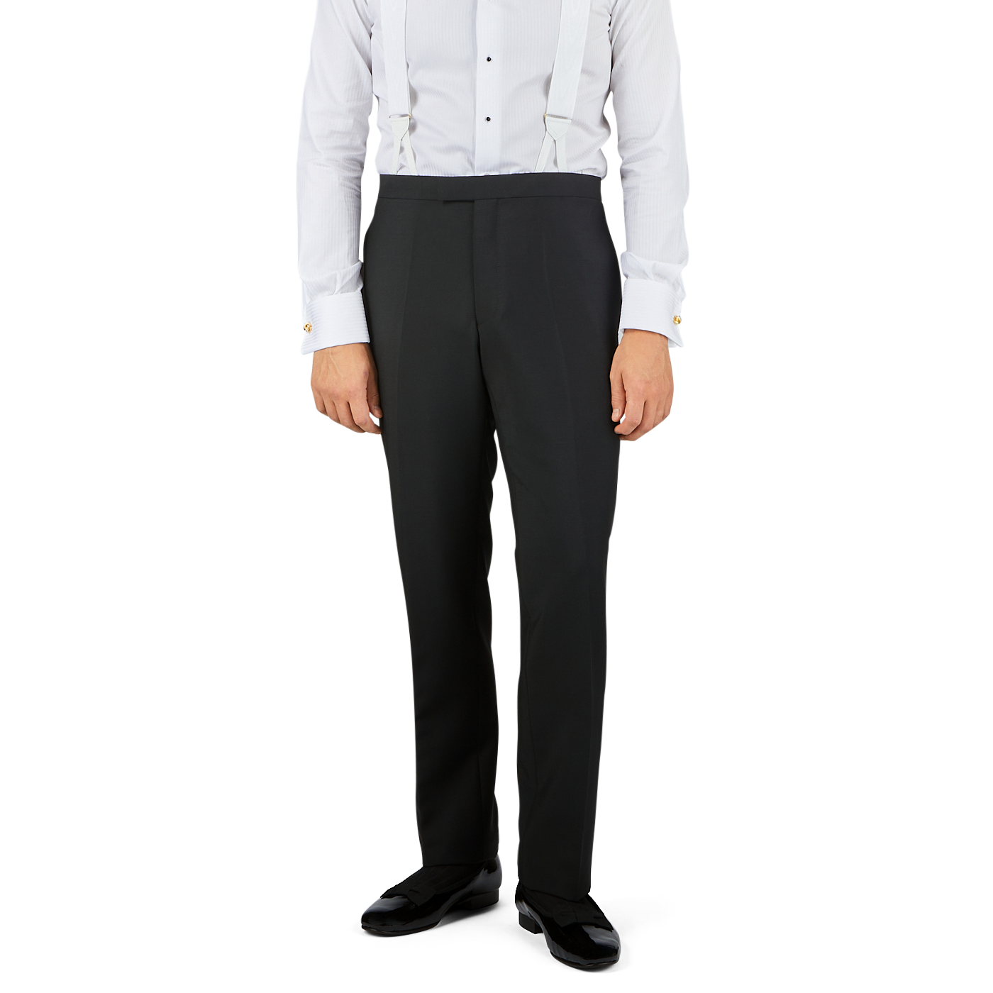 A person wearing **Baltzar Sartorial Black Wool Mohair Tuxedo Flat Front Trousers**, black shoes, a white dress shirt with gold cufflinks, and suspenders. Only the lower torso and legs are visible, presenting a sleek formal look.