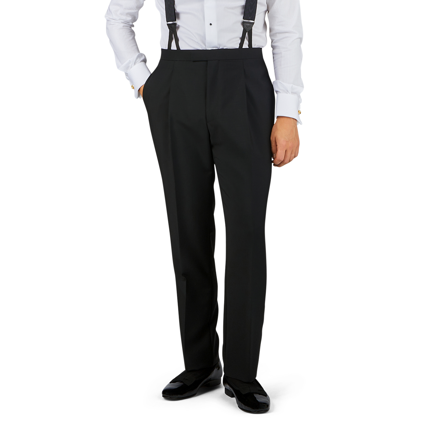 Man in white dress shirt, Black Wool Mohair Tuxedo Pleated Trousers by Baltzar Sartorial with suspenders, and black shoes standing in a neutral pose for a formal look.