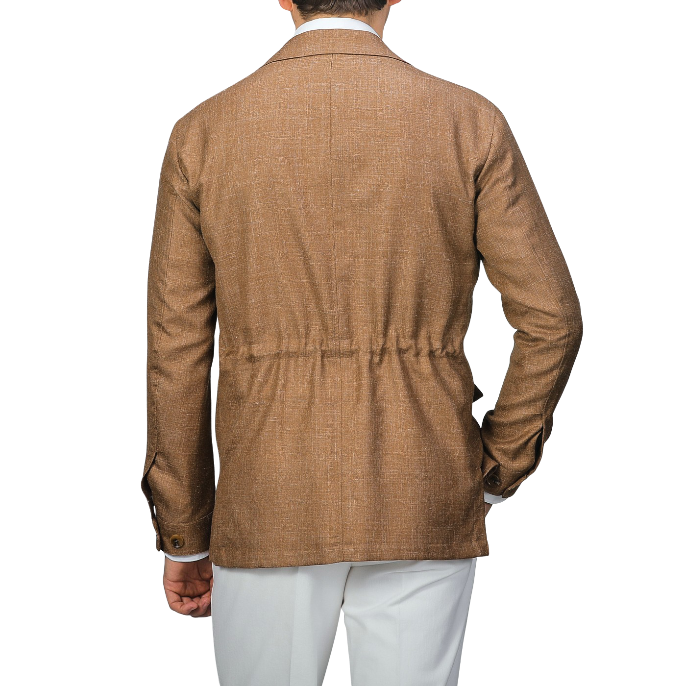 Rear view of someone in a Baltzar Sartorial Camel Brown Wool Silk Linen Safari Jacket, with a cinched waist and paired with white pants, making an ideal tailored blazer alternative.