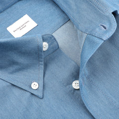 Close-up of the Denim Blue Cotton Twill BD Western Shirt by Baltzar Sartorial, showcasing a regular fit with a button-down collar and visible label, crafted for comfort and style.