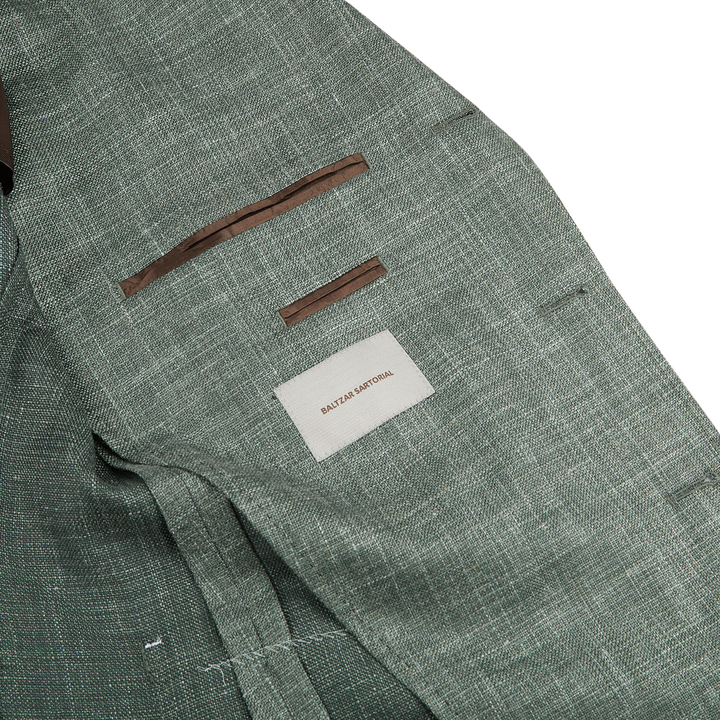 A green Melange Wool Silk Linen Blazer with a brown notch lapel by Baltzar Sartorial.
