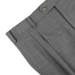 Baltzar Sartorial's Grey High-Twist Wool Pleated Trousers showcase a visible button, belt loops, and pockets against a white background.