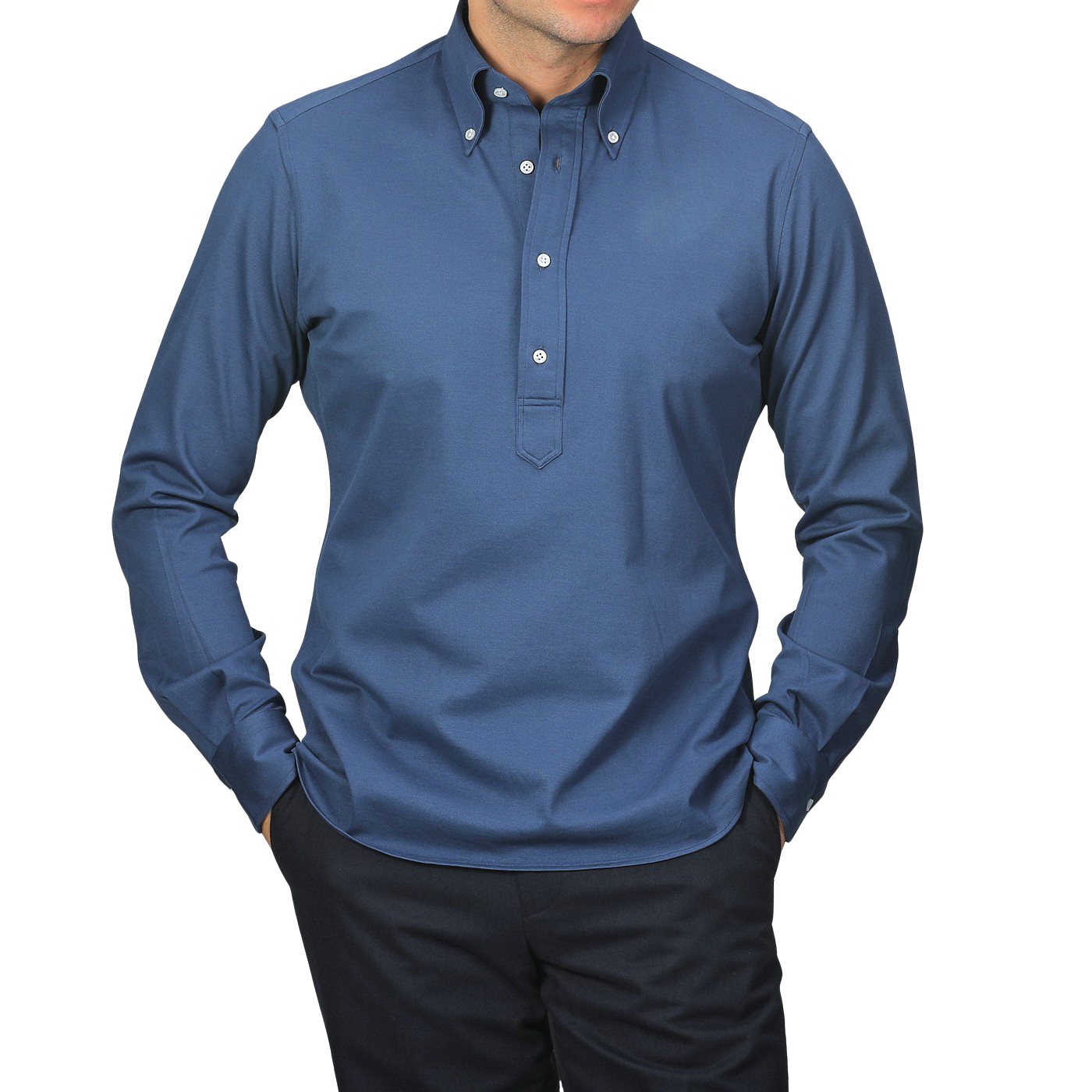 Someone wearing the Indigo Blue Cotton Piqué BD Popover Shirt from Baltzar Sartorial and dark pants, standing against a light gray background.