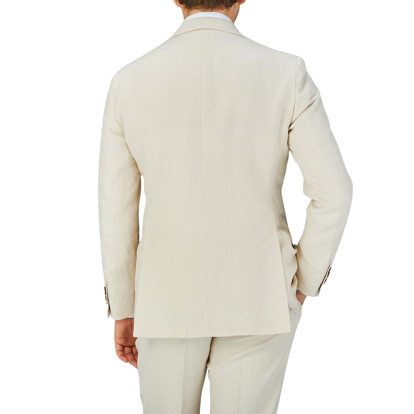 The back view of a man wearing a Baltzar Sartorial Light Beige Pure Linen Suit Jacket and linen fabric trousers.