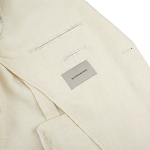 A tailored Light Beige Pure Linen suit jacket by Baltzar Sartorial.