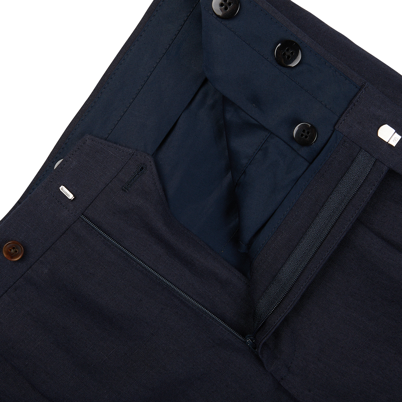 A close up of the pocket of Baltzar Sartorial's Navy Blue Pure Linen Pleated Trousers.