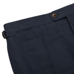 A close up view of Baltzar Sartorial navy blue pure linen flat front trousers.