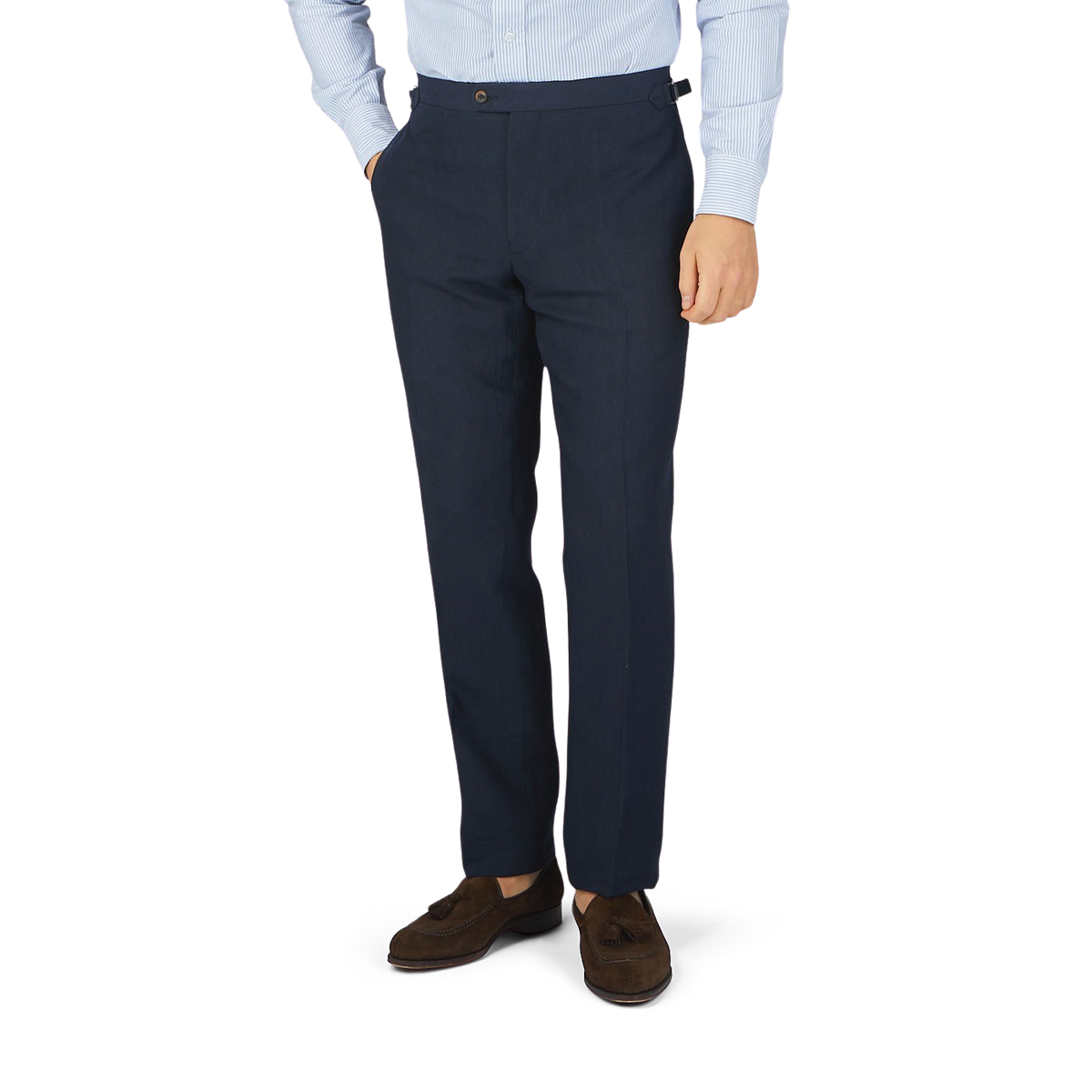 A man in a tailored Baltzar Sartorial navy blue pure linen flat front trousers and shirt.
