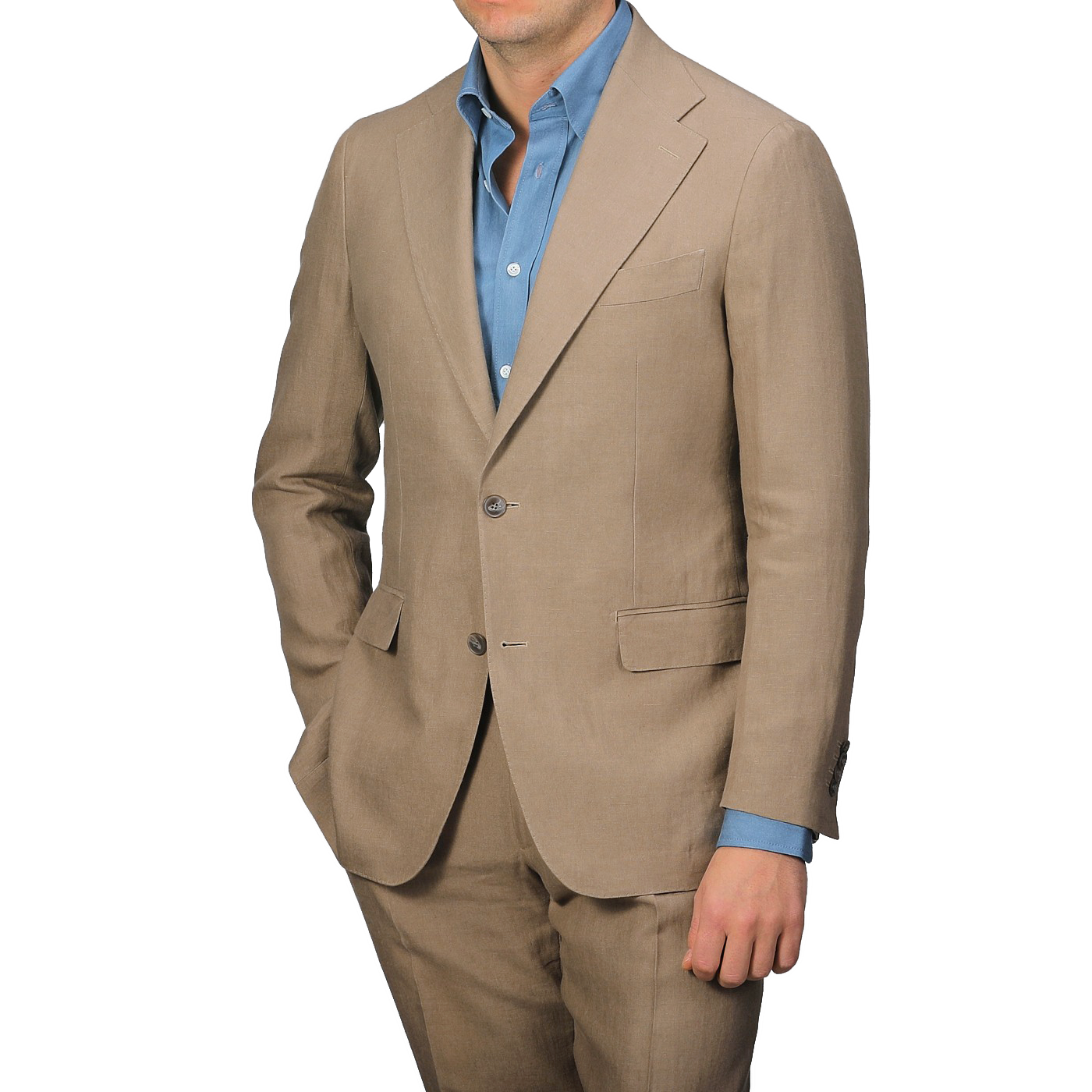 A person in a Taupe Beige Pure Linen Suit Jacket by Baltzar Sartorial and a blue dress shirt stands against a plain background, exuding refined elegance.