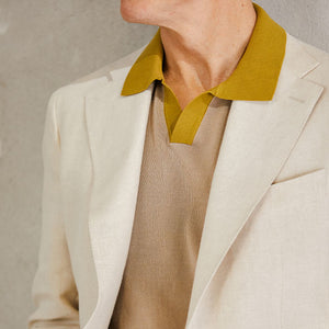 A man in a Gran Sasso beige cotton contrast collar polo shirt.