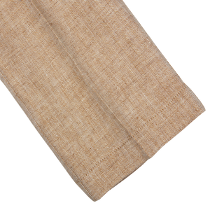 A tan linen drawstring napkin on a white background.
Product Name: Beige Linen Herringbone Drawstring Trousers
Brand Name: Berwich