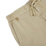 Berwich Beige Washed Linen Drawstring Shorts on a white background.