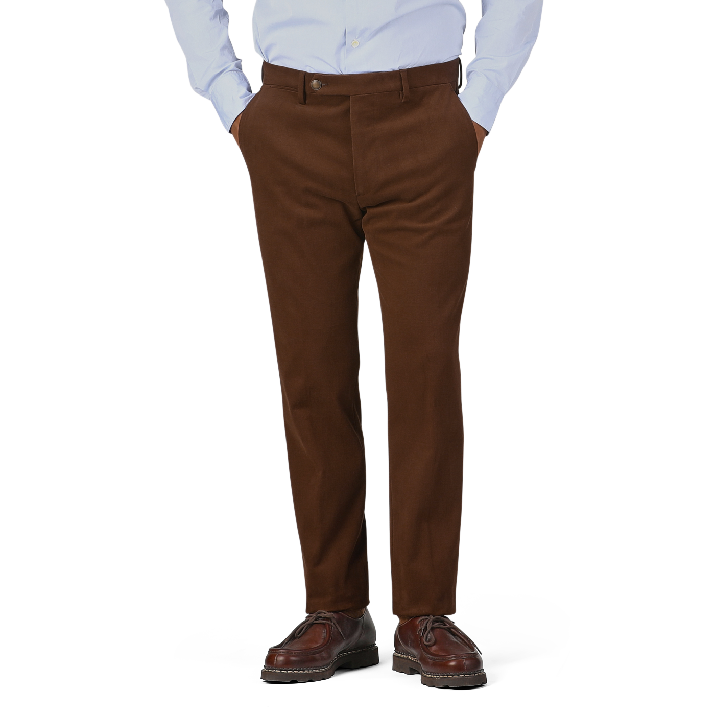 A person is wearing Berwich's Cinnamon Brown Cotton Moleskin Trousers, a light blue shirt, and brown dress shoes.