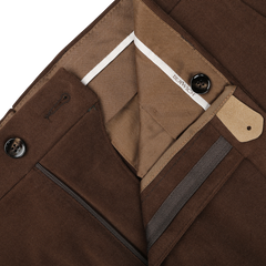 Close-up of the inner lining and button closure of Berwich Cinnamon Brown Cotton Moleskin Trousers, highlighting stitching detail and a white label with the text "BERWICH.