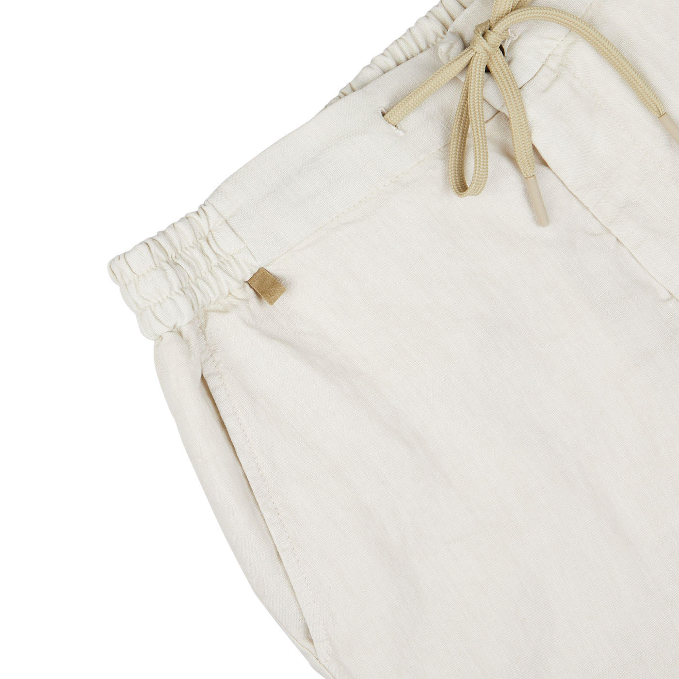 Close-up of a Berwich cream beige washed linen drawstring shorts' waistband with a metal brand tag.